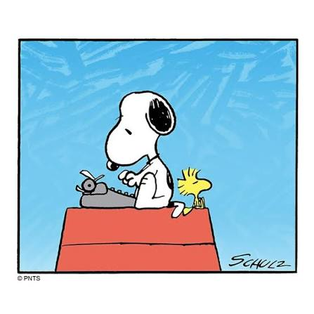 Snoopy typing beside Woodstock on his doghouse, with the original frame, Schulz signature, and copyright notice